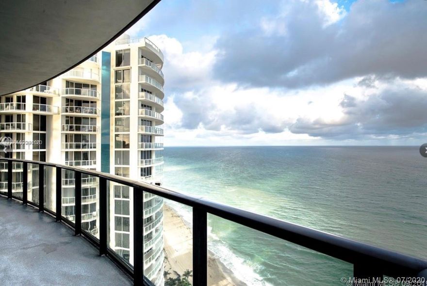 Spectacular direct ocean and city views from this beautifully furnished apartment. Robotic car lift permits you to park right outside your unit. Outdoor terrace features private plunge pool overlooking the ocean with summer kitchen and complete seating area. Building amenities include: 24 hour valet and concierge services, restaurant and bar, oceanfront heated swimming pool with food and beverage service and pool attendants, club room equipped with theater, virtual golf and car simulator video games, pool table, health spa and state of the art fitness center. Apartment is also available for seasonal rental.