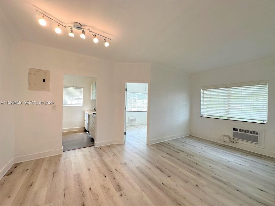 IMMACULATE! Sporting LAUNDRY INSIDE THE UNIT, stainless steel and marble kitchen, brand new floors, new custom paint, a gorgeous floor-to-ceiling tiled bathroom, ample closet space and a wonderful light and bright ambiance! Spectacular location, just steps to Whole Foods, Walgreens, the beach, Espanola Way, Lincoln Road and more. Great back patio also. Secure building and perfectly quiet part of South Beach. Extremely easy to show! Realtors, click show assist and see the instructions in the brokers remarks below.