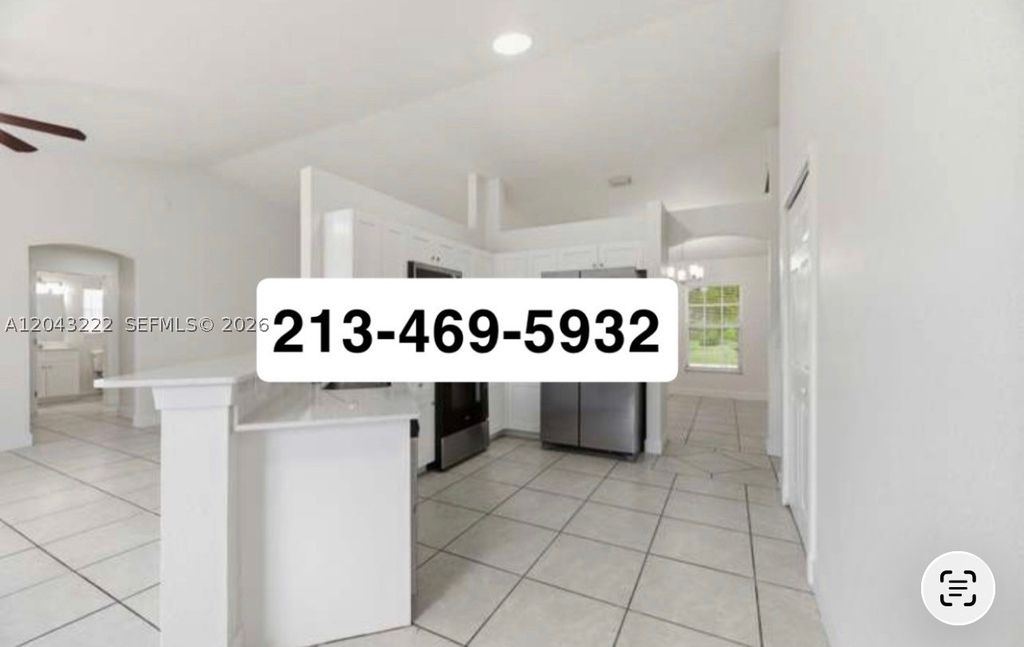 Photo of 2561 NW 18th Ct, Fort Lauderdale, FL 33311 (MLS # A12043222)