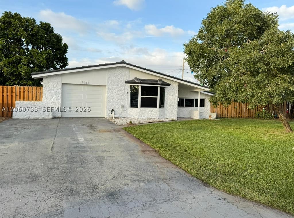 Photo of 7161 SW 13th St, Pembroke Pines, FL 33023 (MLS # A12060733)