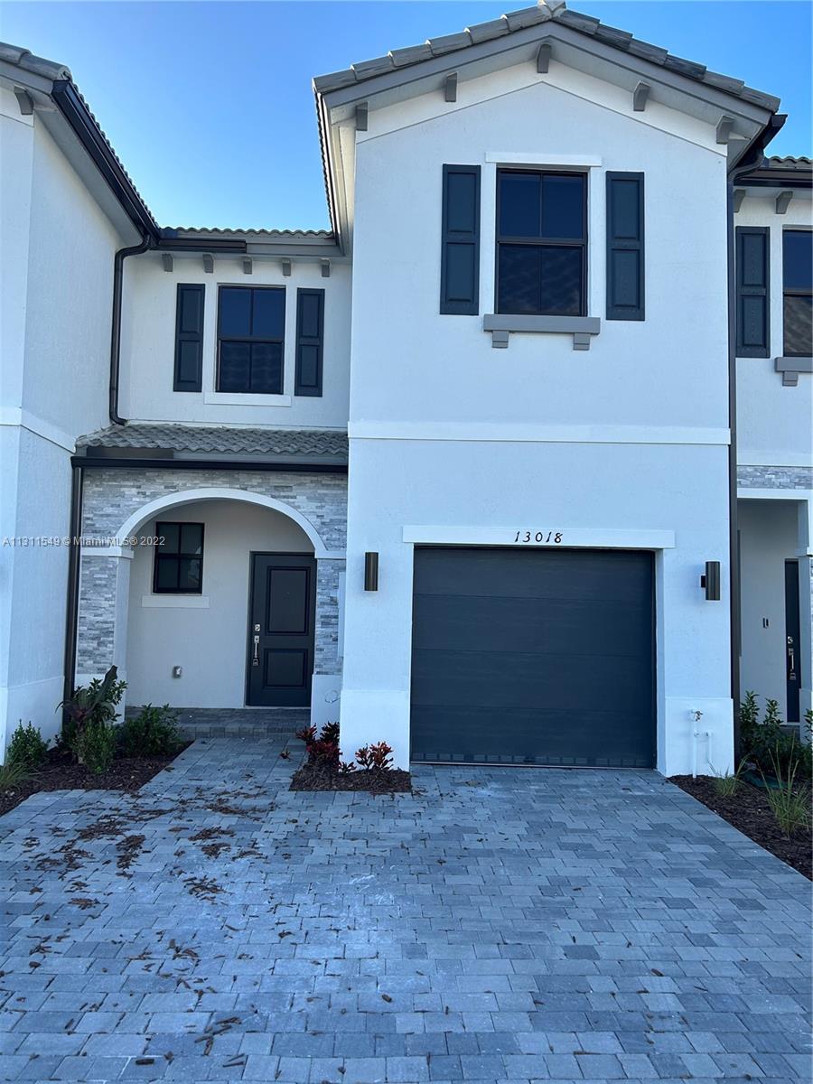 Beautiful townhouse with 3 Beds, 2 full bathrooms on the second floor and a 1/2 Bathroom for guests downstairs. Attached Covered Garage Beautiful Backyard/Patio Area Washer & Dryer conveniently located on the second floor. Be the first to settle into this BRAND NEW home and make it your own!