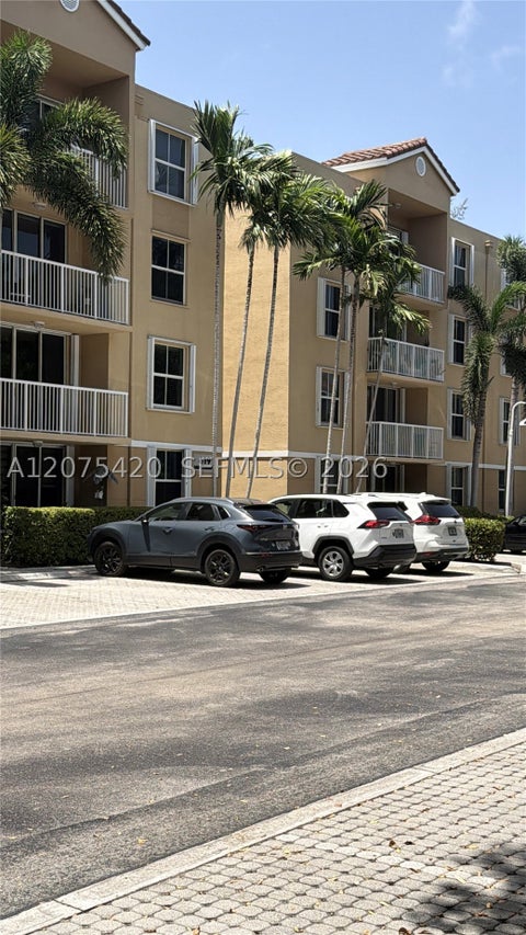 Photo of 619 E Sheridan St #105, Dania Beach, FL 33004 (MLS # A12075420)