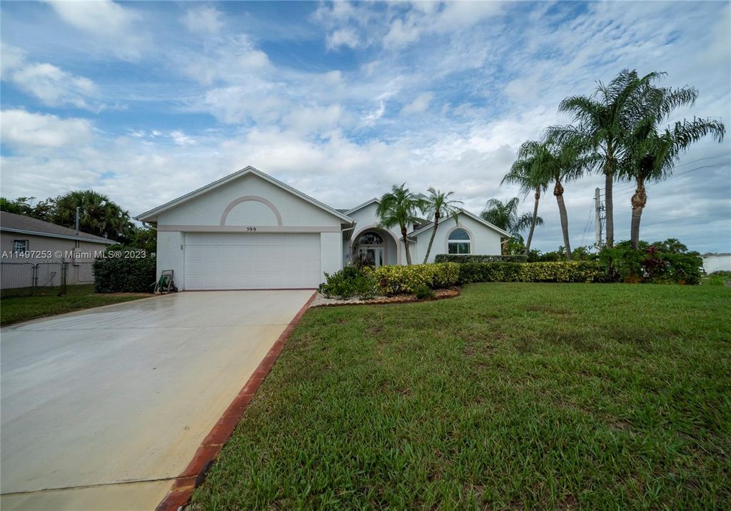 Photo of 599 SE Wallace Ter, Port Saint Lucie, FL 34983 (MLS # A11497253)