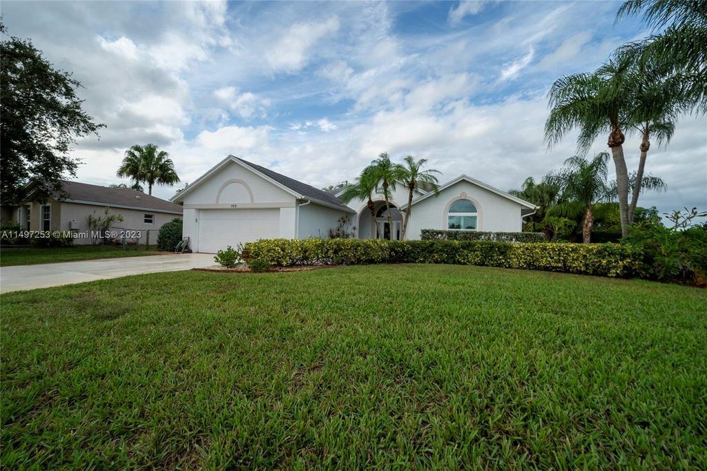 Photo of 599 SE Wallace Ter, Port Saint Lucie, FL 34983 (MLS # A11497253)
