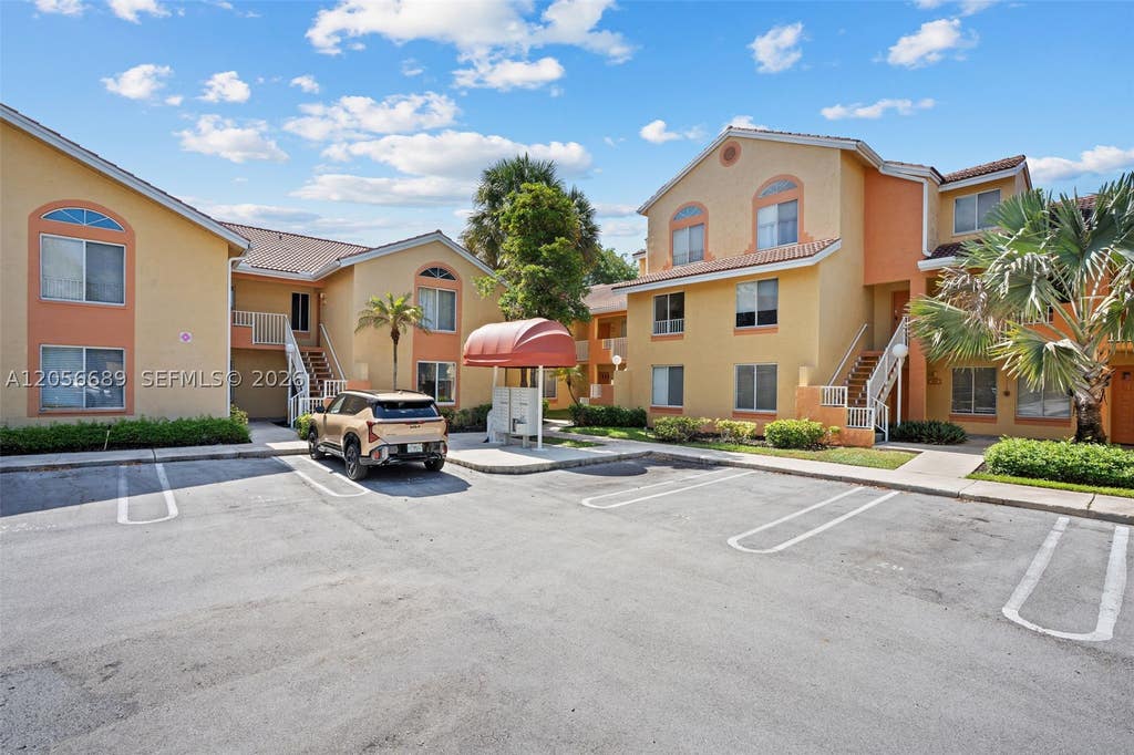 Photo of 927 Coral Club Dr #927, Coral Springs, FL 33071 (MLS # A12056689)
