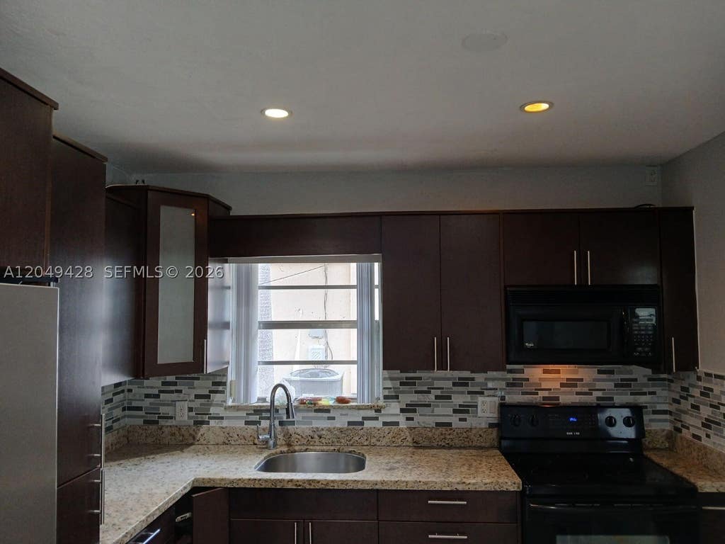 Photo of 2111 N 57th Terrace, Hollywood, FL 33021 (MLS # A12049428)
