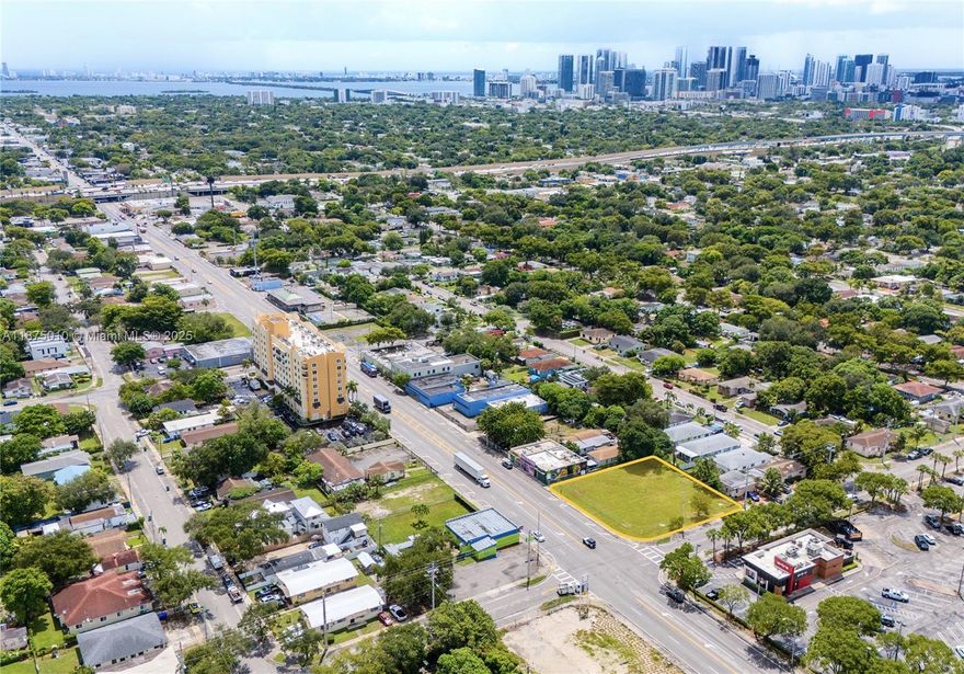 Situated on the NW/NE 54th Street corridor, this opportunity-zone development site offers unmatched visibility and connectivity along one ofMiami’s most important east–west arteries, linking the urban core with rapidly transforming neighborhoods.

The property comes with full site plan approval in place, allowing developers to bypass entitlement risk and move directly into permitting and construction. While zoning permits additional density and height, the seller
has strategically value-engineered the design into a conservative, efficient 21-unit multifamily plan—ensuring a cost-effective project that aligns with market demand and developer bottom line.