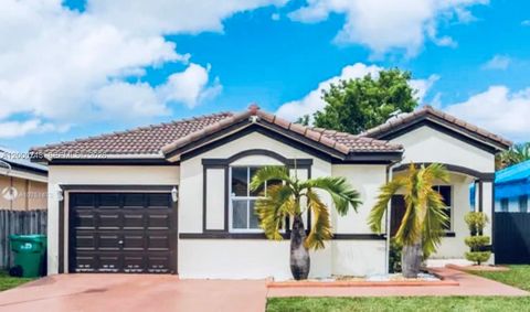 Photo of 8135 NW 198th Ter, Hialeah, FL 33015 (MLS # A12000748)