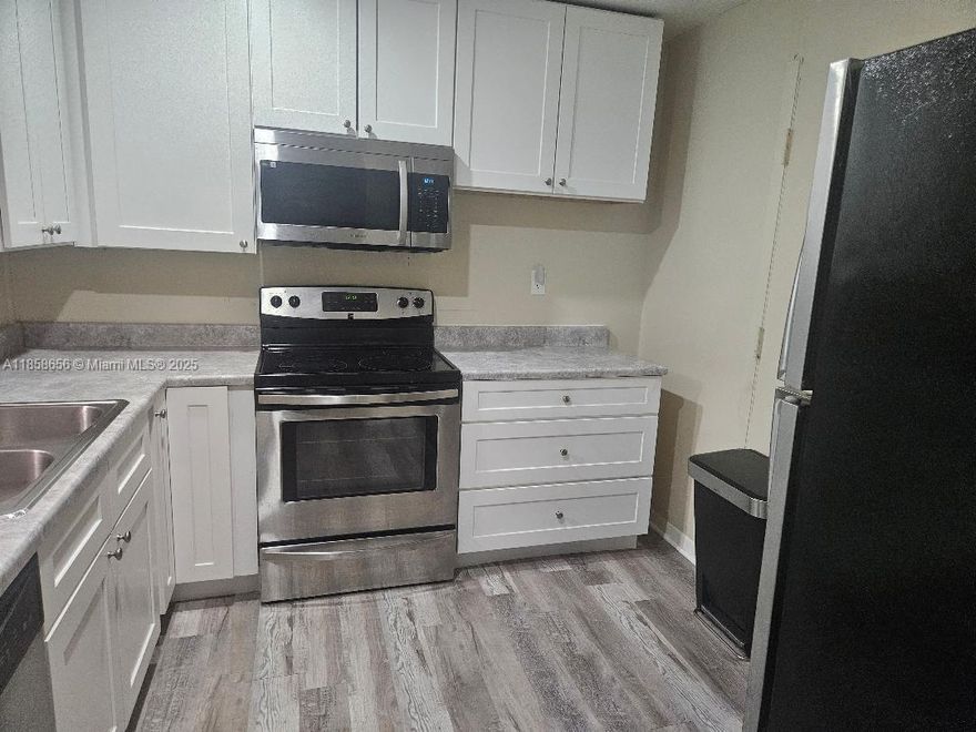 Paradise in Plantation. Enjoy a quiet secluded community in Plantation. Close to all highways and shopping. Move in ready and at 940 sq ft large! Pool area is designed as an oasis, quiet and serene. On site manager. Gym Tennis. Unit has new flooring, shaker kitchen cabinets, stainless steel appliances. Lots of storage space, laundry on each floor. Unit view of pool not parking lot! Tenant in place currently, either will stay and or not. 6.58% return on investment. 50 year recertification done, full reserves, this community is operated successfully.