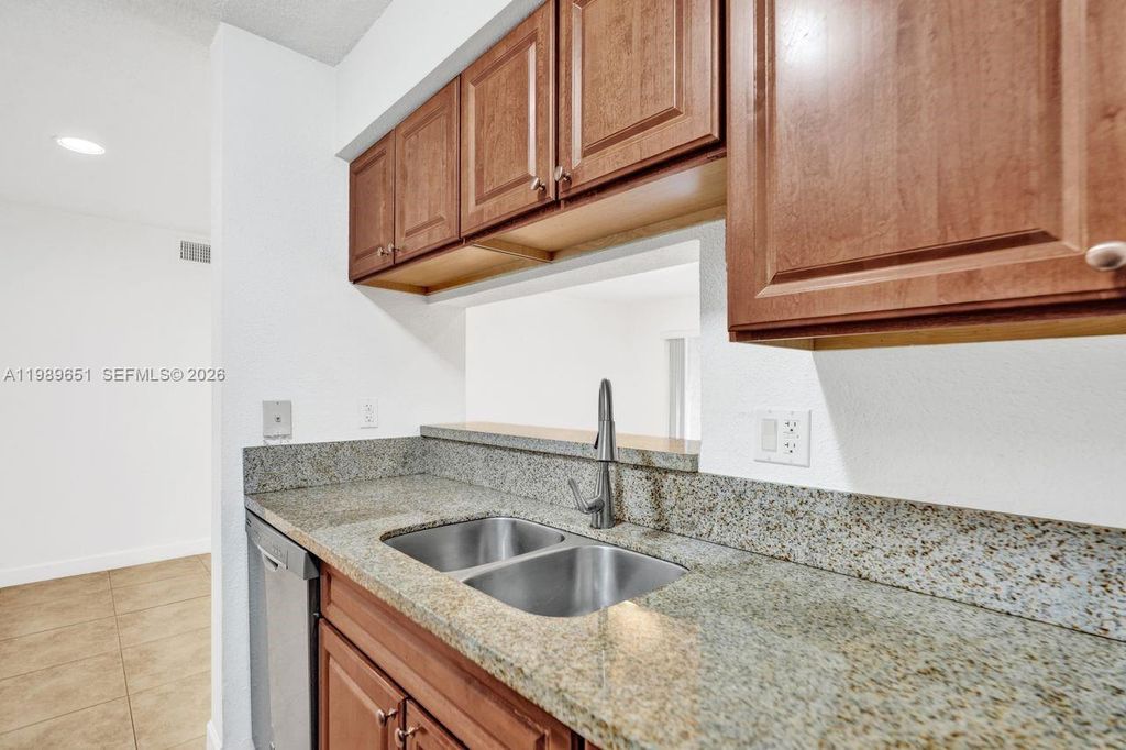 Photo of 949 Riverside Dr #417, Coral Springs, FL 33071 (MLS # A11989651)