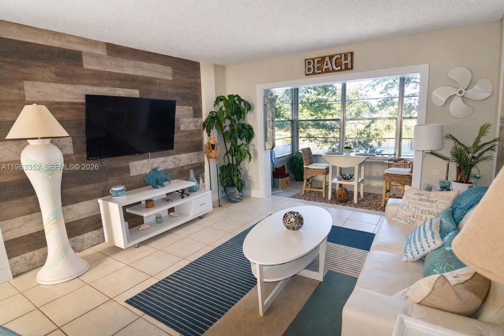 Photo of 3530 NW 52nd Ave #509, Lauderdale Lakes, FL 33319 (MLS # A11983352)