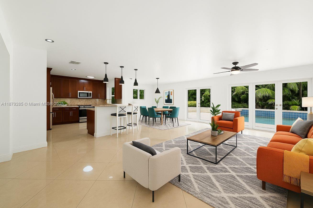 Step into a home with a story to tell. This 4/3 pool home isn’t just another listing, it’s a rare find with size, character & unlimited potential. Originally built in 1960 but completely gutted & rebuilt in 2007 (only one wall left standing), it offers modern systems including new electrical, PVC & copper plumbing & impact windows & doors.
From the moment you walk in, your eyes are drawn through the sunlit, open living & kitchen area straight to the tropical backyard & pool. A layout designed for connection & flow. With over 3,000 sf of living area & generous light throughout, the canvas is set for something extraordinary.
Yes, it needs a little polishing but that’s what makes it so intriguing, a hidden gem priced aggressively below market value. This is where vision meets opportunity.
