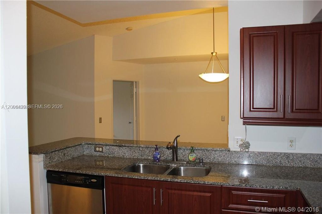 Photo of 2451 Centergate Dr #303, Miramar, FL 33025 (MLS # A12006429)