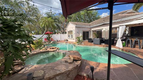 Tiny photo for 4220 SW 153rd Ave, Miramar, FL 33027 (MLS # A12077361)