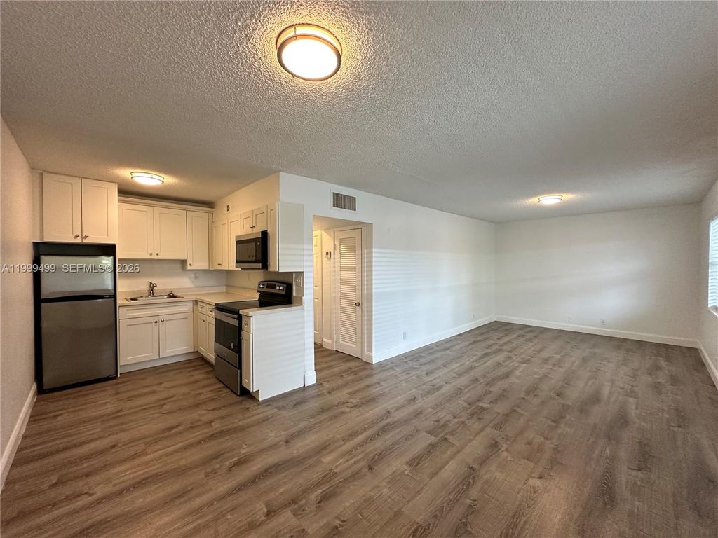 Photo of 2500 Johnson St #17, Hollywood, FL 33020 (MLS # A11999499)