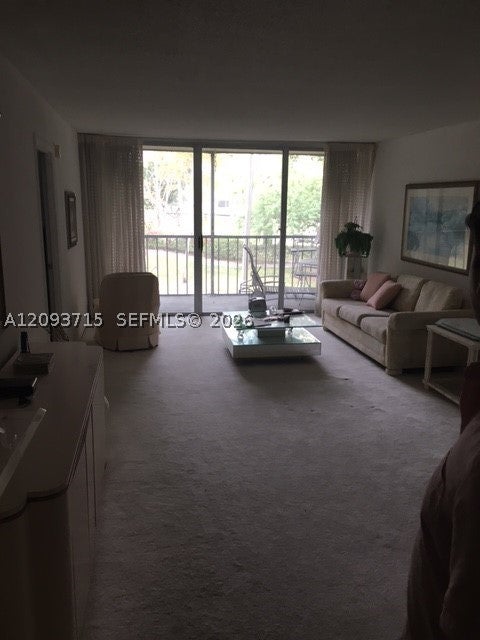 Photo of 7080 Environ Blvd #227, Lauderhill, FL 33319 (MLS # A12093715)