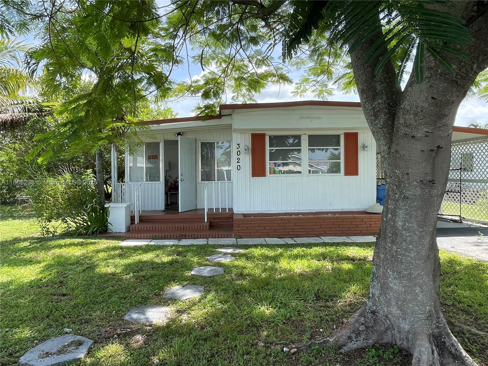 Updated, very spacious 2 bedroom/ 1 bath Manufactured Home. peaceful community, nice location, very well-maintained property, ready to move in Remodeled with hard wood floors, newer Kitchen and bath. Washer and Dryer, Storage Shed, Central AC, Screened Patio, Community Clubhouse, Pool with view of Lake, Jacuzzi and Gym with showers. Walls and Ceilings finished with drywall. Gated Community, very close to all Major Highways, BCC, Nova University and Hard Rock Casino. Pet Friendly. Can Lease right away. Adult Community but may allow if you are in your 50's.