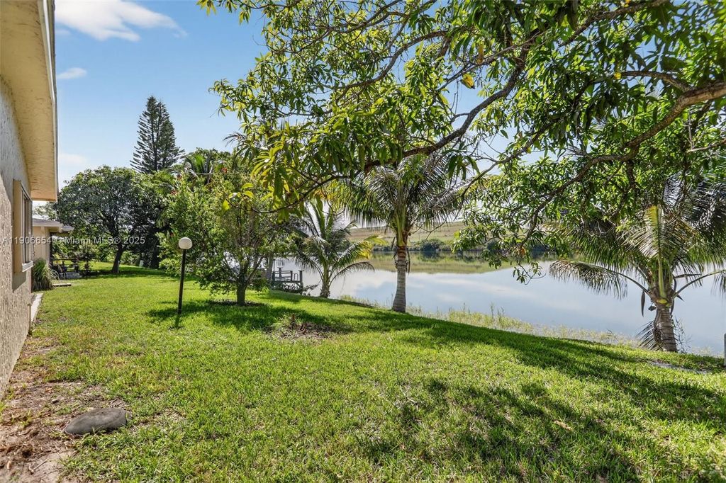 Photo of 4871 NW 18th Ave, Deerfield Beach, FL 33064 (MLS # A11906654)