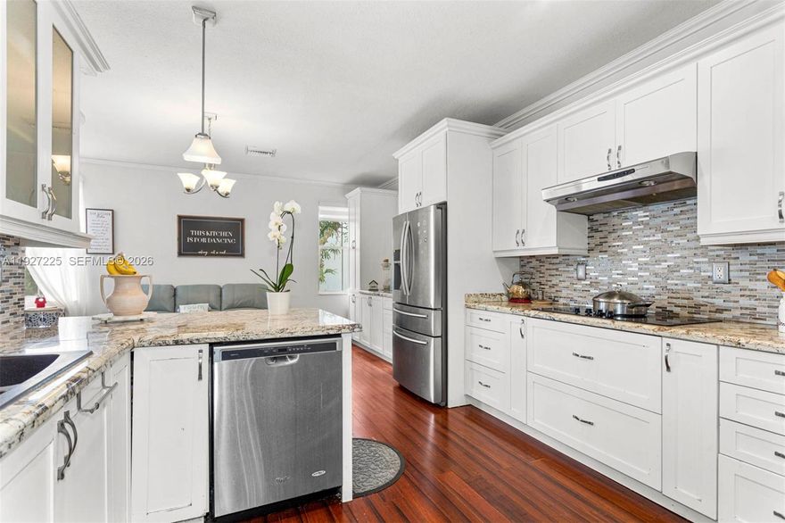 This inviting 4-bedroom, 2-bath residence tucked inside a serene gated community with low HOA fees and private lake access, where warm, natural Cherrywood floors welcome you in, sets the tone for a home crafted with care and comfort in mind. Every bedroom features custom-built closets, offering both elegance and effortless organization.
The home is equipped with a newer HVAC system: a 2016 outside unit, a 2020 inside unit and coil, a full home water filtration system, exterior awning and accordion shutters, giving you peace of mind for years to come. The kitchen is appointed with stainless steel appliances, perfect for both everyday cooking and hosting. A spacious 2-car garage adds convenience and storage flexibility. Property comes with electric shutters for hurricane protection.
Step outside to your own slice of calm, private lake access, where you can start your mornings with a quiet cup of coffee taking in the stillness of the water and the soft rise of the day.
This home is truly a rare blend of charm, functionality, and lifestyle.