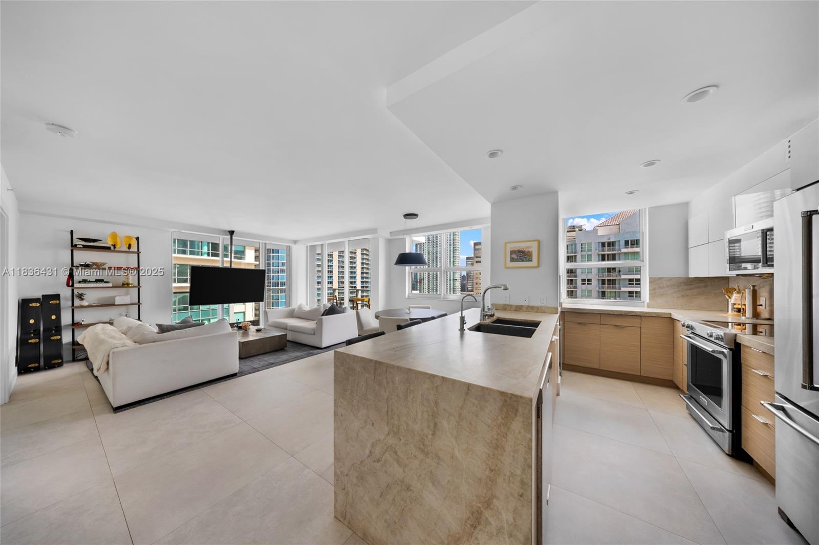 Fully renovated residence with amazing skyline and ocean views. This corner unit has an abundance of natural light and an intelligent new layout with a much more functional design. Renovations include new bathrooms, new open kitchen with custom quartz counters, wine fridge, new AC, new washer/dryer, built in closets, an ample amount of storage and much more. The building offers 5 star amenities including large swimming pool, outdoor hot tub, tennis court, BBQ area, gym, 24-hour concierge, on-site restaurant, convenience store and so much more. Water, basic cable & internet included. One assigned parking space with option for more. The unit is also available for sale, the owner is motivated and open to a rent-to-own arrangement. Monthly rentals allowed.
