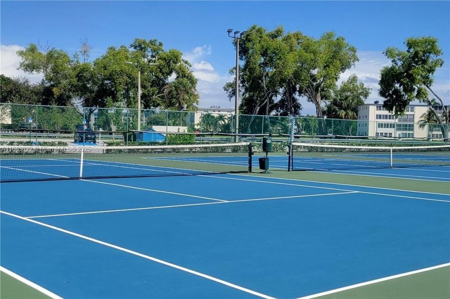 ** GREAT INVESTMENT OPPORTUNITY **OK TO LEASE 1ST YEAR
Bright, Clean & Airy. Move-in ready 55+ community. Live your best life with TONS OF AMMENITIES including Shuttles to Shopping Centers, Shuffleboard, Bocce Court, Pickleball, Tennis, Fishing, Media Room, Clubs, Classes, BBQ, Tiki Huts,Fitness Center, Theater, Pools,Art Studio, Library, 2 Synagogues. Guard Gate for added security. Recently upgraded condo is freshly painted with 2 NEW AC units, NEW Hot Water heater, & NEW refrigerator.NEW roof. Building exterior recently painted. Hurricane-impact front entry door & primary bedroom sliders. Screened balcony off primary bedroom overlooks a beautiful lake. New ceiling fans throughout condo. Laundry facilities each floor. Storage area.Cable/Internet/Water/Trash included