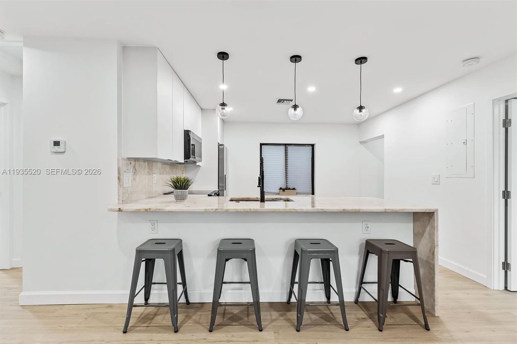 Photo of 1101 SW 19th Ave, Fort Lauderdale, FL 33312 (MLS # A11935520)