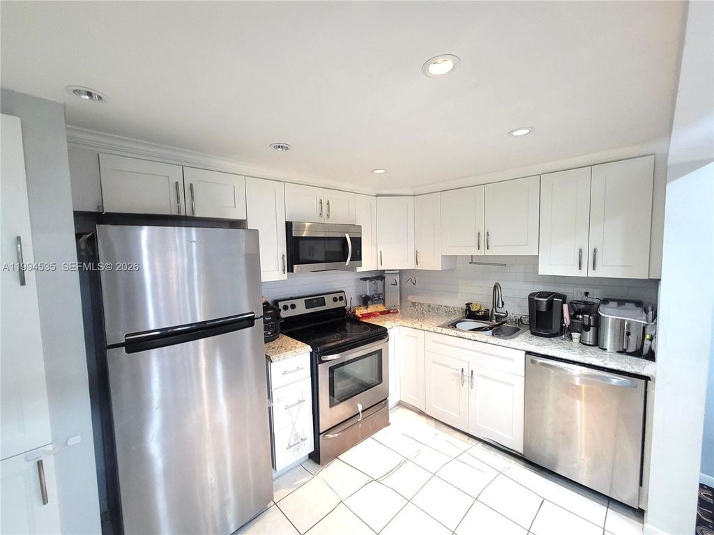 Photo of 4270 NW 89th Ave #104, Coral Springs, FL 33065 (MLS # A11994535)