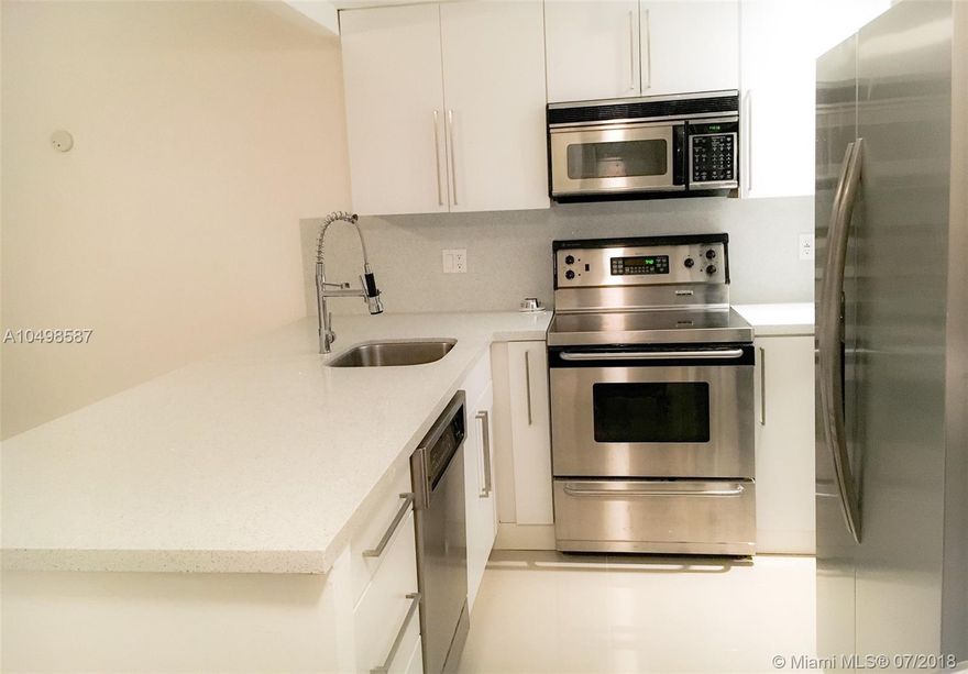 Amazing remodeled 1/1 in the gated community of Greenwich in North Miami. Upgraded kitchen with stainless steel appliances,new cabinets and counter tops. Tile flooring throughout the unit and spacious bedroom with walk in closet. Bathroom has new vanity and tub. Secured building with assigned parking. Laundry is located on every floor. Excellent location behind the Whole Foods on Biscayne Blvd. Centrally located to downtown Miami, South Beach and Aventura.