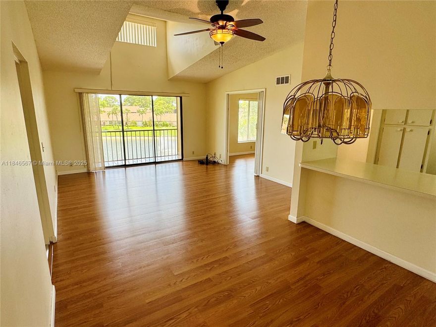 55+ COMMUNITY. Discover tranquility in this vacant, easy-to-see 2 bd & 2 baths condo in the serene Palm Beach. Featuring a spacious layout and an upgraded screened and painted balcony perfect for relaxing, this apartment offers a peaceful retreat in a quiet community. Don't miss complete NEW AC and heating system, NEW hot water tank, all NEW kitchen appliances, NEW laminate floors, all NEW screens, NEW washer & dryer and upgraded bathroom plumbing. 
Enjoy great amenities including a pool, hot tub, tennis/pickleball courts, shuffleboard, and bocce courts, cable is included. For sale and ready for you to make it your own - seize the chance to enjoy a great location with a couple lakes and calm surroundings!