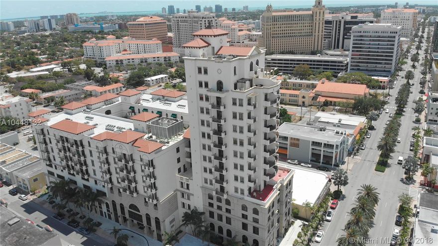 CLICK ON VIEW VIRTUAL TOUR to see NEW video!>>>Amazing luxury condo located in The Ponce Tower, blocks away from miracle mile. Walk to restaurants, boutiques, banks and shops or take the Coral Gables Trolley. Enjoy 11ft ceilings, wood cabinetry with stainless steel accents, granite counter tops and stainless steel appliances. Washer and Dryer included along with a walk in closet and jacuzzi in unit. Relax and enjoy the pool or jacuzzi since its situated on the same floor. Feel secure with card entry and security at the front desk. Centrally located in the heart of the action of Coral Gables.