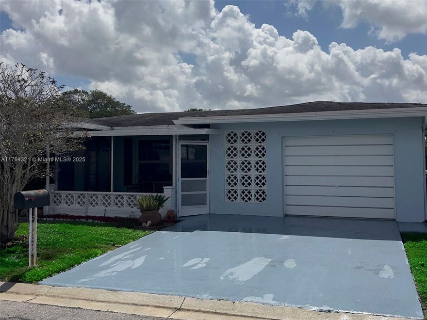 Discover an unbeatable value with this move-in ready, turnkey 2-bed, 2-bath home in quiet Paradise Gardens, a 55+ community—priced below market value! Enjoy serene canal views from the screened-in back patio, while the front screened-in patio provides another space to relax. Inside, you’ll find a spacious living and dining area, a Florida room, and ample closet space in both bedrooms. The large laundry room includes a washer, dryer, and extra storage. A one-car automatic garage adds convenience, and irrigation from the canal keeps your landscaping lush at no cost! Outside, enjoy a great space for grilling and entertaining. With a 6-year-old A/C and 5-year-old water heater, this home offers peaceful waterfront living—one of the best values in Broward County! Schedule your showing today!