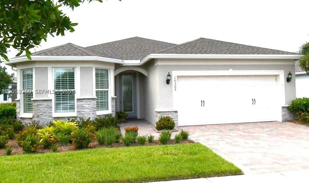 Photo of 10305 SW Zaffre Ln, Port St Lucie, FL 34987 (MLS # A12053260)