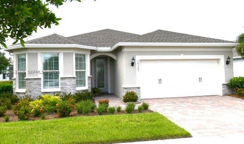 Photo of 10305 SW Zaffre Ln, Port St Lucie, FL 34987 (MLS # A12053260)