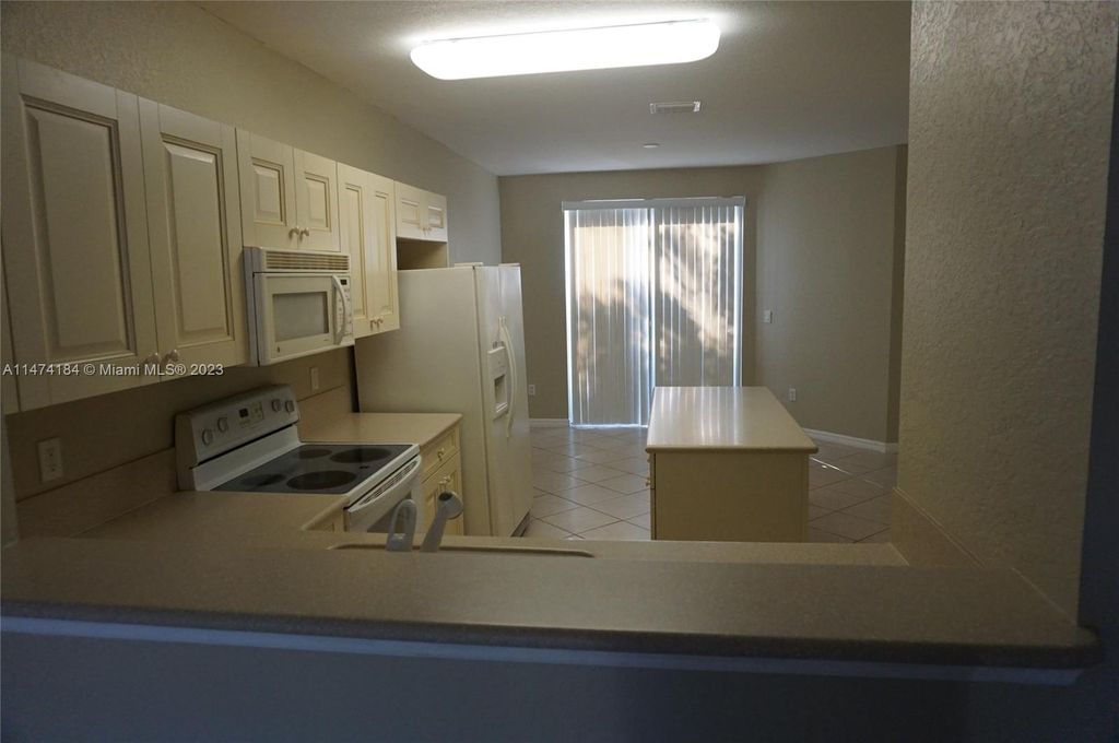 Photo of 3631 Sonoma Dr #-, Riviera Beach, FL 33404 (MLS # A11474184)