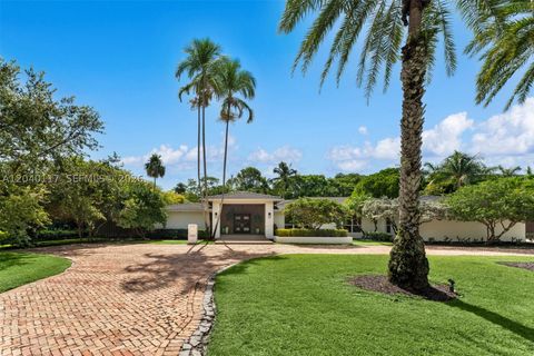 Photo of 11721 Jacaranda Pl, Coral Gables, FL 33156 (MLS # A12040117)