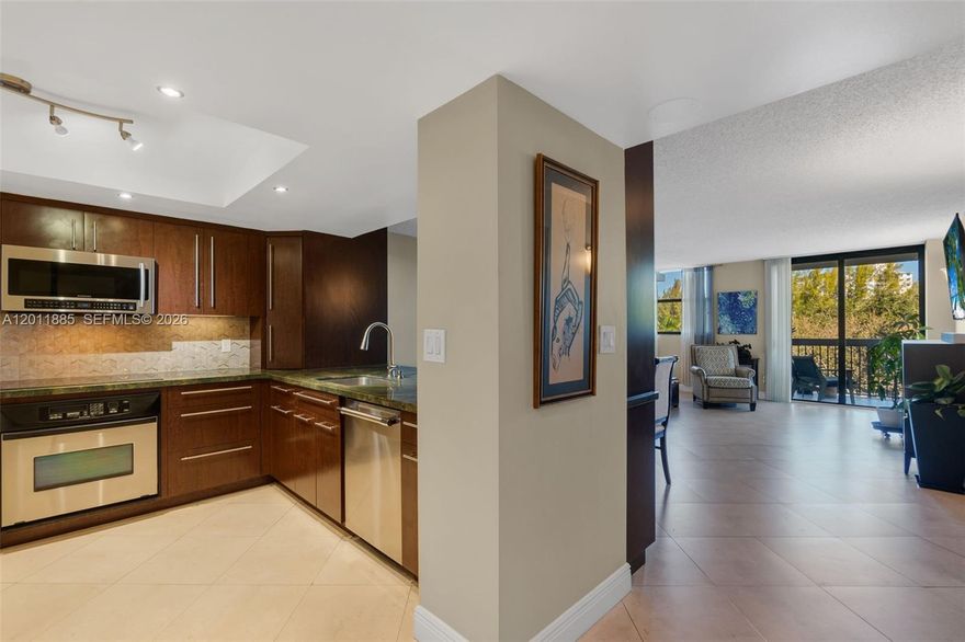 BEAUTIFULLY RENOVATED and OVER-SIZED ONE-BEDROOM! Located on Intracoastal, and a few minutes walk to the beach! The condo offers unparalleled closet space. Large primary bathroom and half bath for guests too. Large OPEN eat-in kitchen, custom cabinets, granite counters off dining and living area. Small office nook too! Large balcony with lovely views. IMPACT WINDOWS throughout. Washer-Dryer in the unit. 24/7 security, outdoor BBQ, garage & guest parking. Wifi and Cable included. Located close to the beach, restaurants, shopping, and golf. PET FRIENDLY - 2 pets allowed! 40-Year Inspection complete! RESERVES FUNDED. NO ASSESSMENTS. Super LOW HOA!