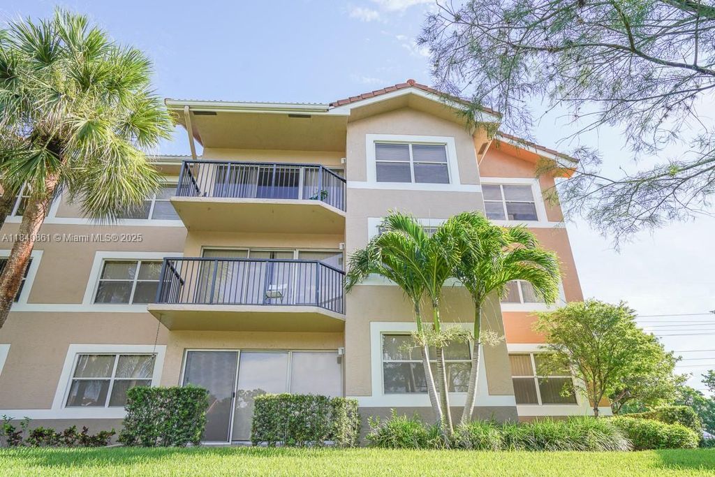 Photo of 9033 Wiles Rd #304, Coral Springs, FL 33067 (MLS # A11840861)