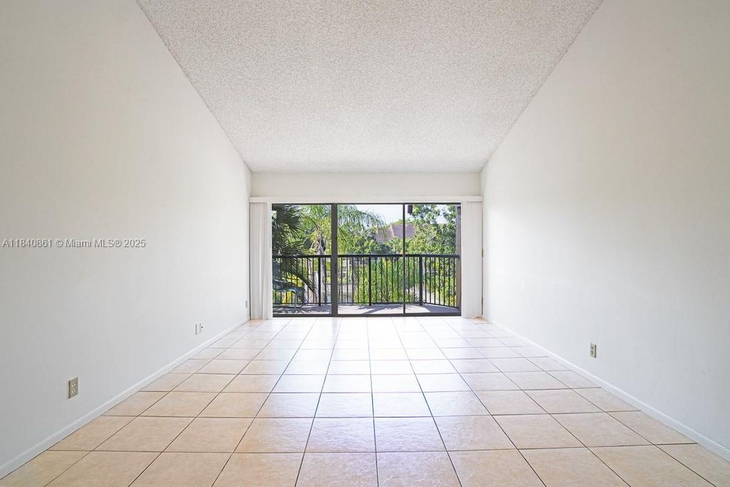 Photo of 9033 Wiles Rd #304, Coral Springs, FL 33067 (MLS # A11840861)