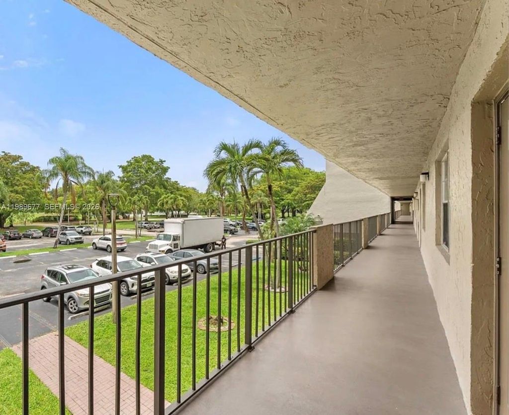 Photo of 3150 W Rolling Hills Cir #209, Davie, FL 33328 (MLS # A11989677)
