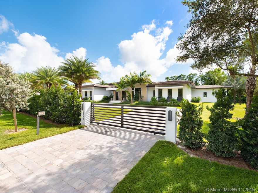 Spectacular and Striking! Brand new transitional one story masterpiece! Sleek architectural design with modern flair! Situated on excellent oversized 55300 sf lot in prime Pinecrest! Imposing entry with two gated entry and 3 cg!Finest finishes and detailed attention throughout. Open floor plan! Elegant formal living and dining rooms! Gorgeous gourmet chef ultra deluxe kitchen with all most current modern appliances! Lavish master suite w/ sitting room and designer spa luxurious bath! All bedrooms are generously sized ensuites with beautiful baths!
Fabulous family room with wet bar! Addl. media/play room, office. Separate guest quarter and staff suites! Marble floor,quartez counters & outdoor gazebo with Blt-in Grill! Inviting large patio and sparking pool! Much more!A gem! Over 10000 SF!