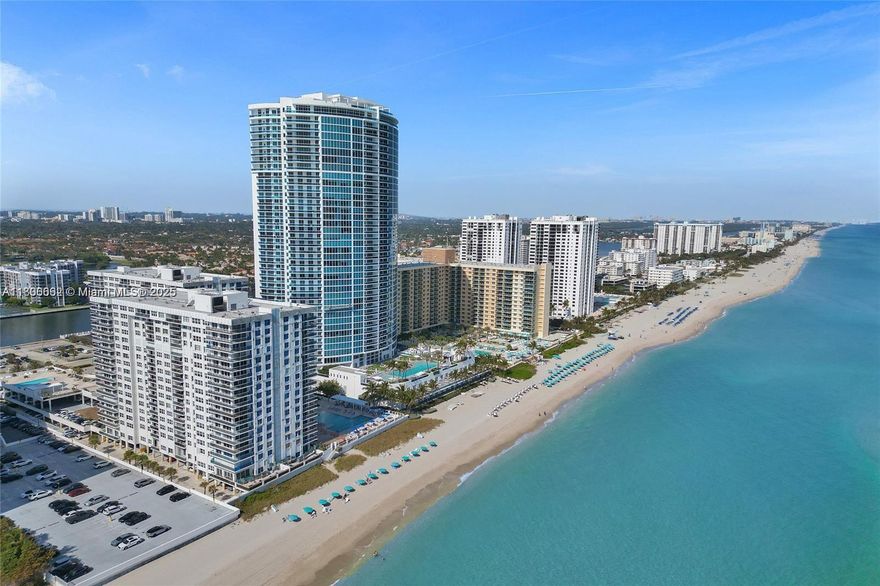 SPECTACULAR CORNER UNIT APARTMENT WITH WRAP AROUND BALCONY. ONE OF FEW APARTMENTS IN AQUARIUS BUILDING WHICH WAS COMPLETELY REMODELED WITH A 11 FOOT CEiLING. OPEN CONCEPT MODERN KITCHEN WITH QUARTZ COUNTERTOP, STAINLESS STEEL APPLIANCES, WALK-IN CLOSETS, 2BED, PLUS DEN CONVERTED INTO FULL BEDROOM, 2BATH, 1/2BATH. LOT OF NATURAL LIGHT THROUGHOUT THE APARTMENT. THE 1800/SF APARTMENT OFFERS A WIDE FLOOR PLAN TO COMFORTABLY ENTERTAIN LARGE GATHERINGS. FLOOR TO CEILING WINDOWS WITH REMOTE CONTROL WINDOW SHADES THROUGHOUT THE LIVING ROOM. SEPARATE LAUNDRY ROOM WITH STORAGE SPACE INCLUDING WASHER/DRYER (1YEAR OLD WASHER, 3 MONTHS OLD DRYER WITH 5 YEAR EXTENDED WARRANTY NEW "BOSCH" NEW AIR CONDITIONING UNIT. AMENITIES ARE PLENTIFUL FROM SAUNA, BILLARD,  PING-PONG, CHESS, LIBRARY, GYM, 2 PARTY ROOM