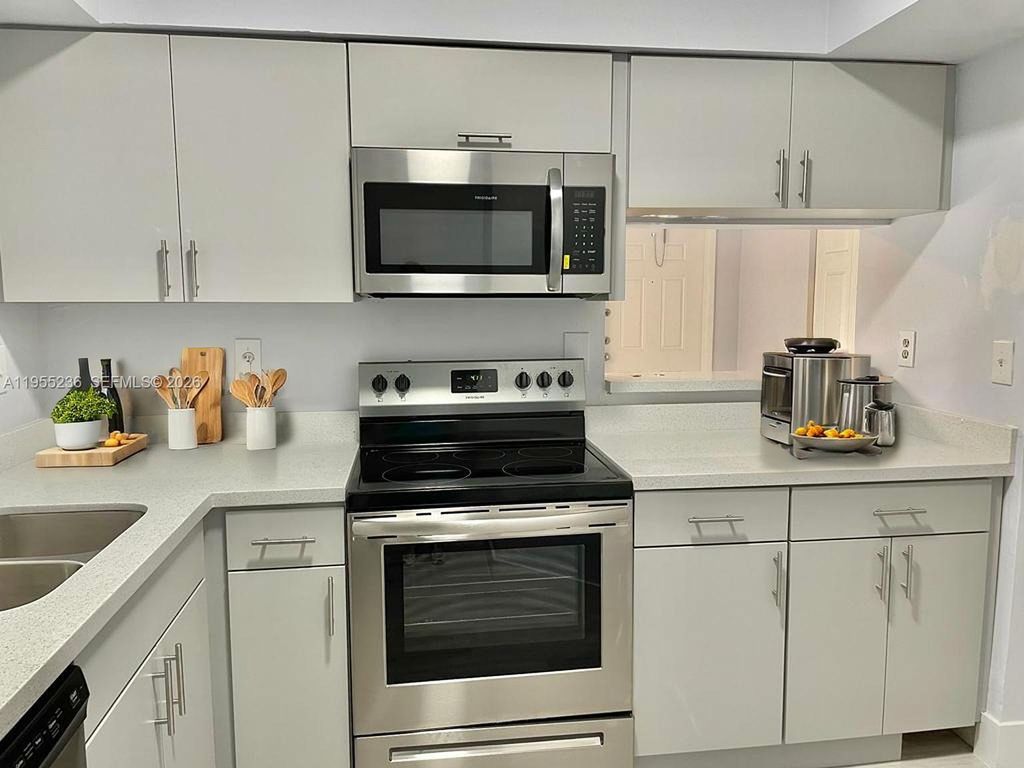 Photo of 1971 NW 96th Ter #9F, Pembroke Pines, FL 33024 (MLS # A11955236)