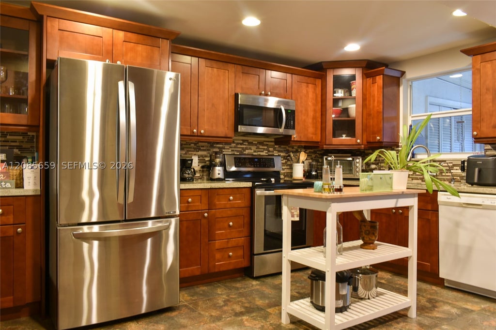 Photo of 1327 N 15th Ave #22, Hollywood, FL 33020 (MLS # A12085659)