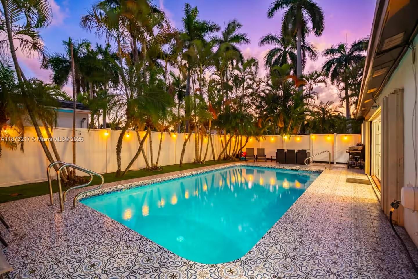 Step into your tropical getaway—this bright, open 4-bed, 3-bath home just minutes from Hollywood Beach has everything for relaxing and entertaining. Featuring an updated kitchen and baths, spacious living areas filled with natural light, and a lushly landscaped backyard with a sparkling pool. With its expansive lot, circular driveway, and prime location near shops, dining, and the famous Hollywood Broadwalk, this home blends comfort, elegance, and coastal charm in one of the area’s most desirable neighborhoods.