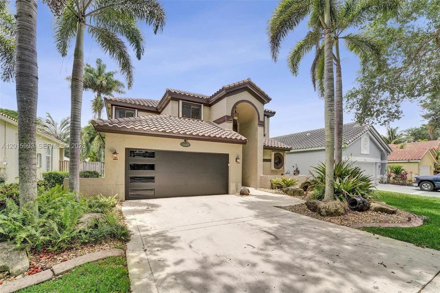 Nestled within the highly sought-after community of Embassy Lakes, this beautifully updated 4-bedroom, 2.5-bath residence combines modern upgrades with timeless comfort. Beautiful newly renovated kitchen, with quartz countertops, high-end stainless-steel appliances, and custom wood cabinetry. Spacious living areas and an inviting layout create a warm and functional atmosphere with the primary bedroom on first floor plus 3 bedrooms upstairs.  The spacious primary suite features a custom designed walk-in closet, soaking tub, separate shower and dual sink vanity. Complete impact windows and doors, New Trane AC system, updated electrical throughout the home and a new roof in 2020. Residents of Embassy Lakes enjoy access to a community clubhouse, resort-style amenities, and top-rated schools, all within one of Cooper City’s most desirable neighborhoods. This exceptional home offers the perfect blend of location, style, and modern convenience — perfect for both everyday Florida living and entertaining.