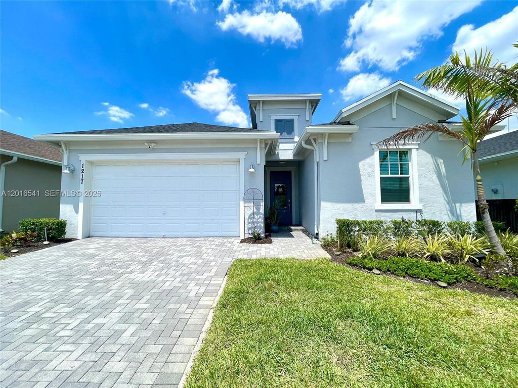 Photo of 1217 SE Crosswood Way, Port St Lucie, FL 34984 (MLS # A12016541)