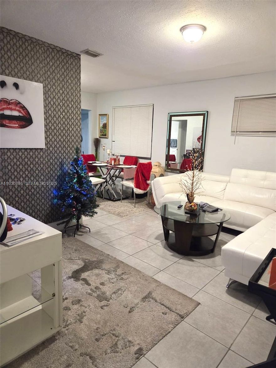 Income producing and well located property with great long term tenants and low expenses. Front unit is a large 2/1 rented for $2000/mo and rear unit is a 1/1 rented for $1350. Well located 6 min from design district, close to mayor highways, Wynwood and Allapattah Health District.