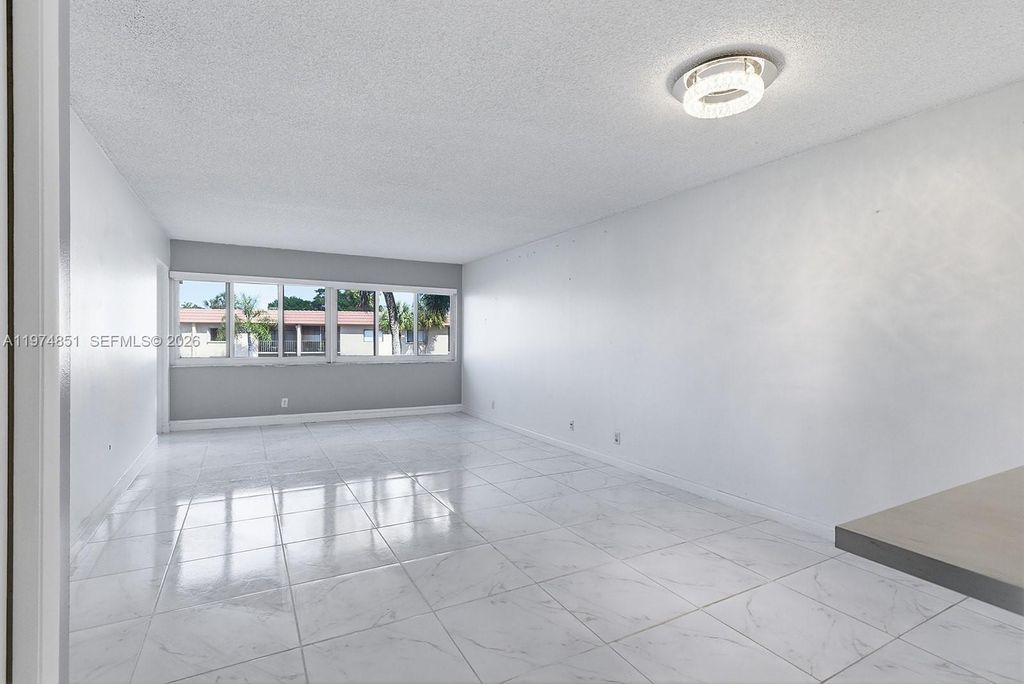Photo of 140 Lakeview Dr #203, Weston, FL 33326 (MLS # A11974851)