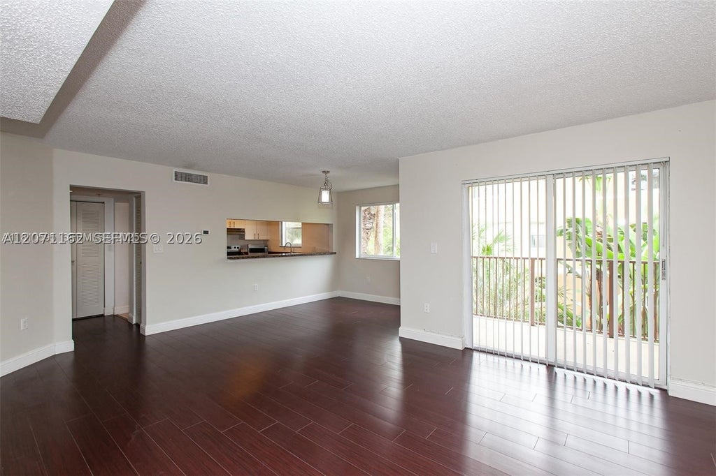 Photo of 771 N Pine Island Rd #214, Plantation, FL 33324 (MLS # A12071162)