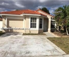 Photo of 16323 NW 23rd St #16323, Pembroke Pines, FL 33028 (MLS # A12084805)